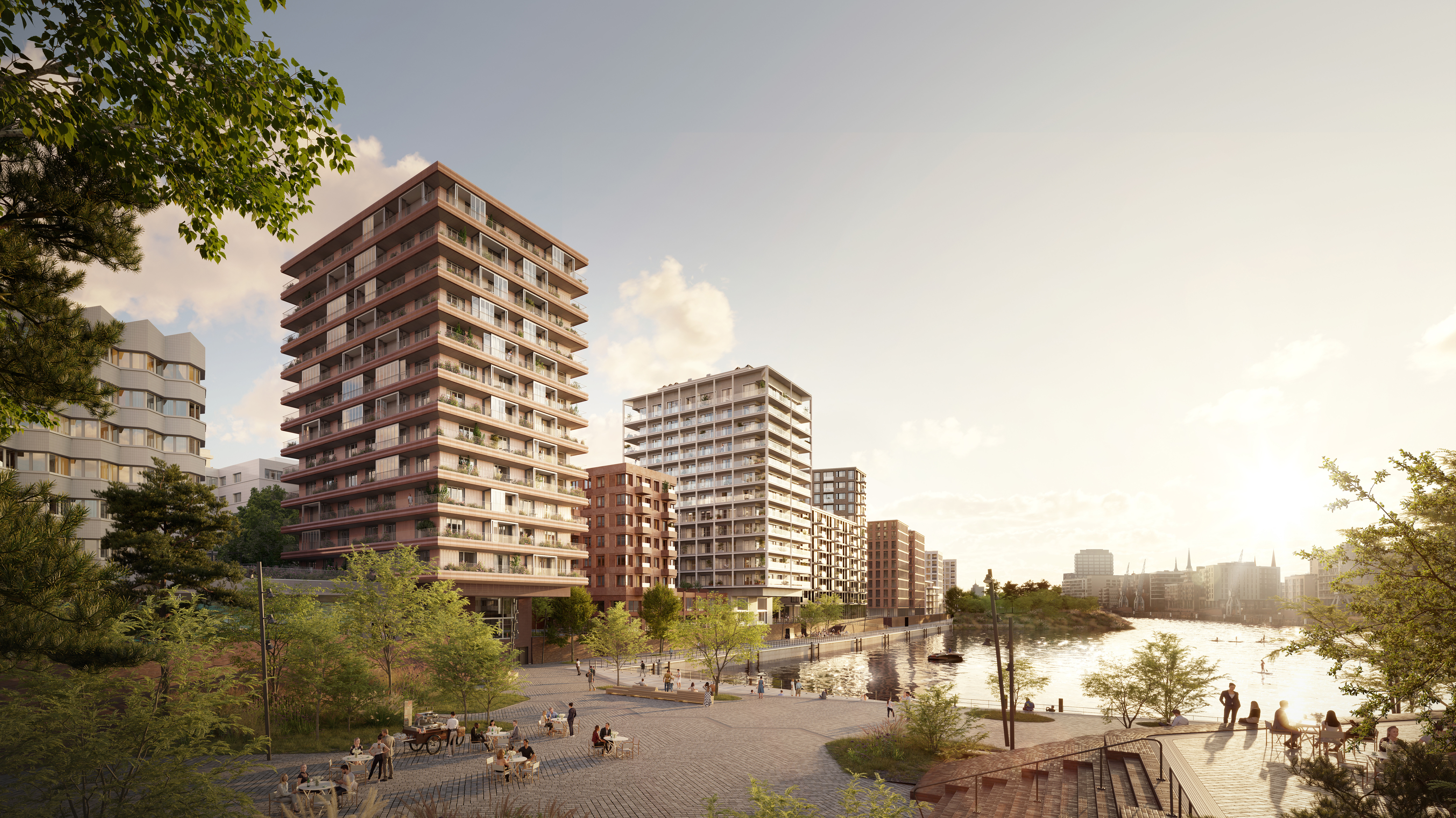 Blick auf zwei architektonisch moderne Gebäude am Wasser.