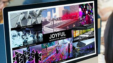 Auf einem Bildschirm wird ein Logo und ein Design abgebildet