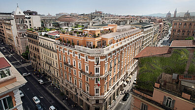 Exterior perspective of a house facade in Rome.