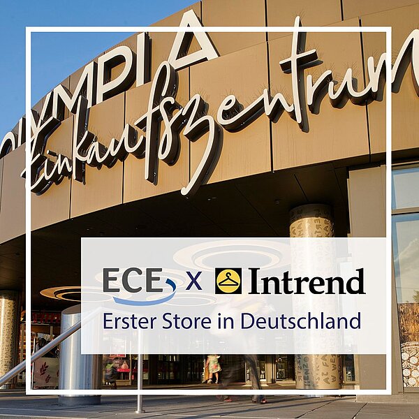 Eingangsbereich des Olympia-Einkaufszentrums München mit Ankündigung der ersten Intrend-Filiale in Deutschland.