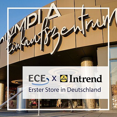 Eingangsbereich des Olympia-Einkaufszentrums München mit Ankündigung der ersten Intrend-Filiale in Deutschland.