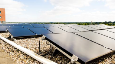 Photovoltaic arrays on the roof of a building.
