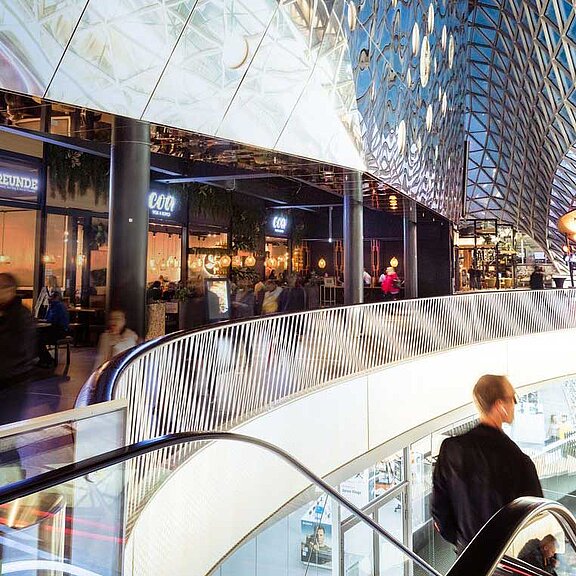 Interior view of a shopping center in Frankfurt with impressive glass elements as a ceiling