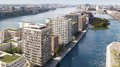 Several architecturally modern apartment blocks located directly on the waterfront in Hamburg.