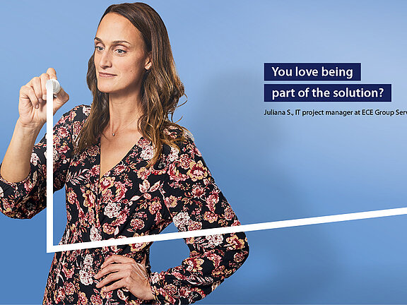 A woman against a blue background draws a frame bearing the words "Creating space. Inspiring people. We give you space to inspire people. Find your place with us. Your space to grow.".